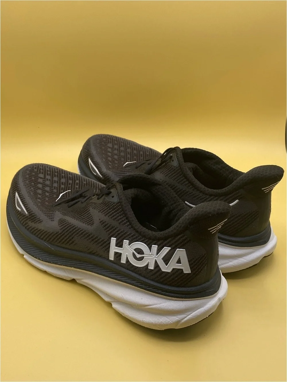 HOKA Clifton 9 in black and white